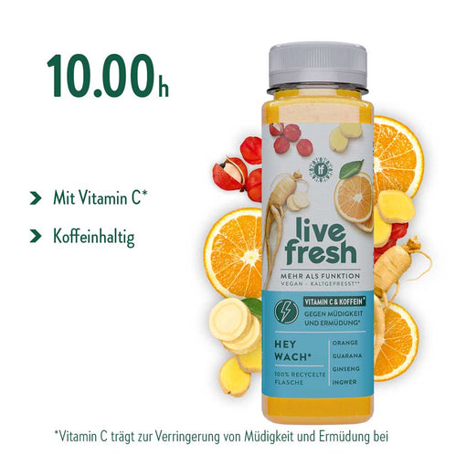 Gelbe Live fresh Flasche Hey Wach mit Orange Guarana Ginseng und Ingwer vor Orangenscheiben Ingwer und roten Guaranabeeren. Der Text lautet 