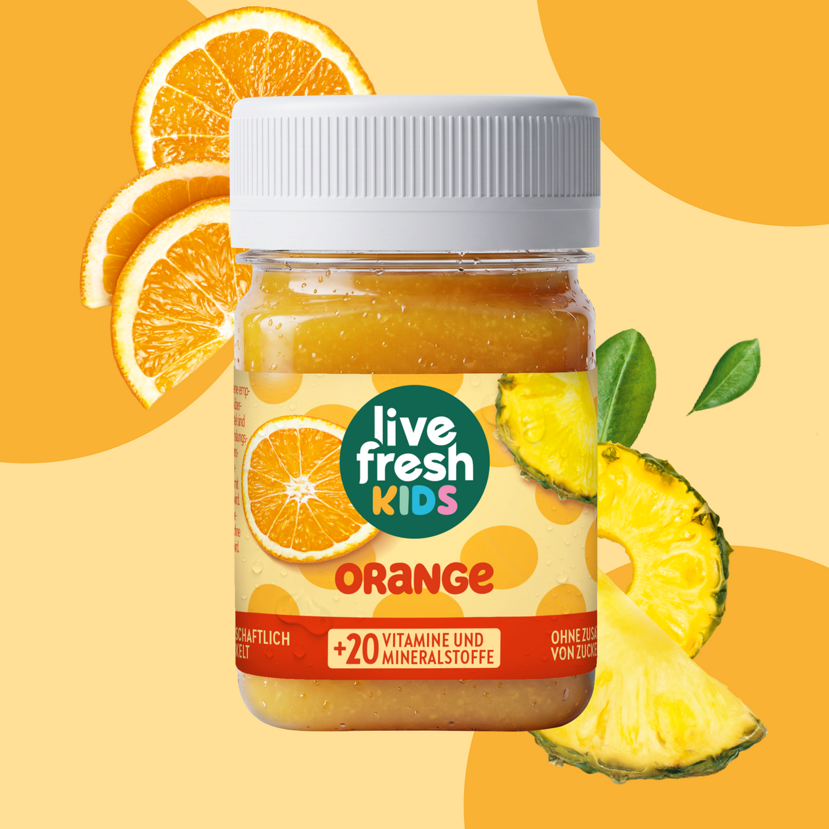LiveFresh Kids Orange in a glass against an orange background with fresh orange slices and pineapple chunks. The label reads "live fresh KIDS," "ORANGE," and "+20 VITAMINS AND MINERALS."