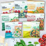 Verschiedene Live Fresh Bowls und gesunde Fertiggerichte in bunten Verpackungen. Zu sehen sind unter anderem High Protein Curry. High Protein Pasta. Gemüse Chili. Fajita Mexican Style. High Protein Rice und Bowl Exotic Style.